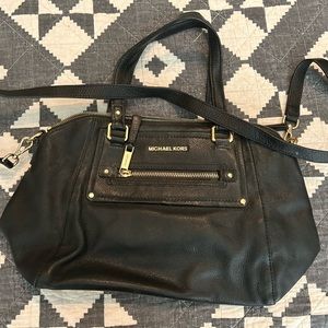 Michael Kors black leather purse. Good used condition. Just a few scuffs.